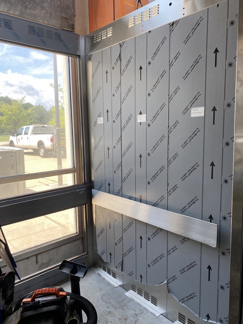 Interior view of a brand-new elevator cab at Downtown Largo, November 2023